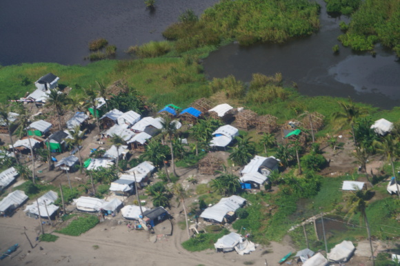 Still living in tents: A year after, many Yolanda-devastated Taclobanons remain in tents. Photo taken on Nov. 4, 2014, from aboard a plane, moments before touchdown at the Tacloban DZR (TAC) airport.