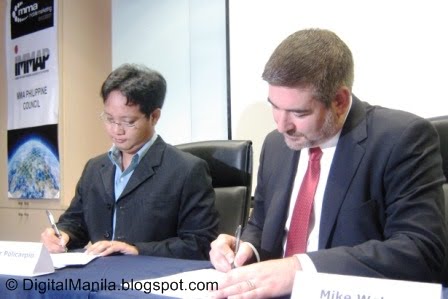 IMMAP's Arthur Policarpio and MMA's Mike Wehrs formalize their group's partnership